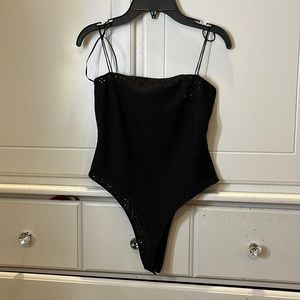 black, semi sheer body suit